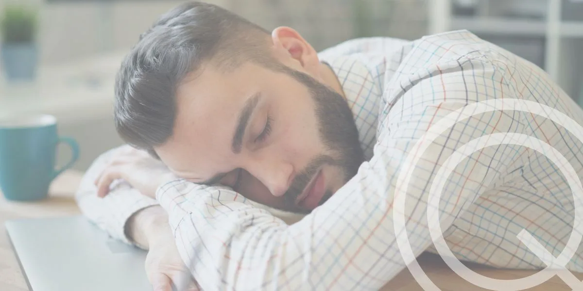 Man asleep on a desk